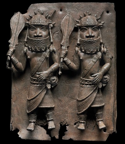 A bronze depiction of two officials of the Benin Kingdom with raised swords