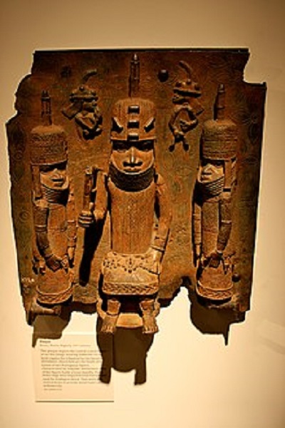 An Oba, with two kneeling attendants, and 2 Portuguese figures